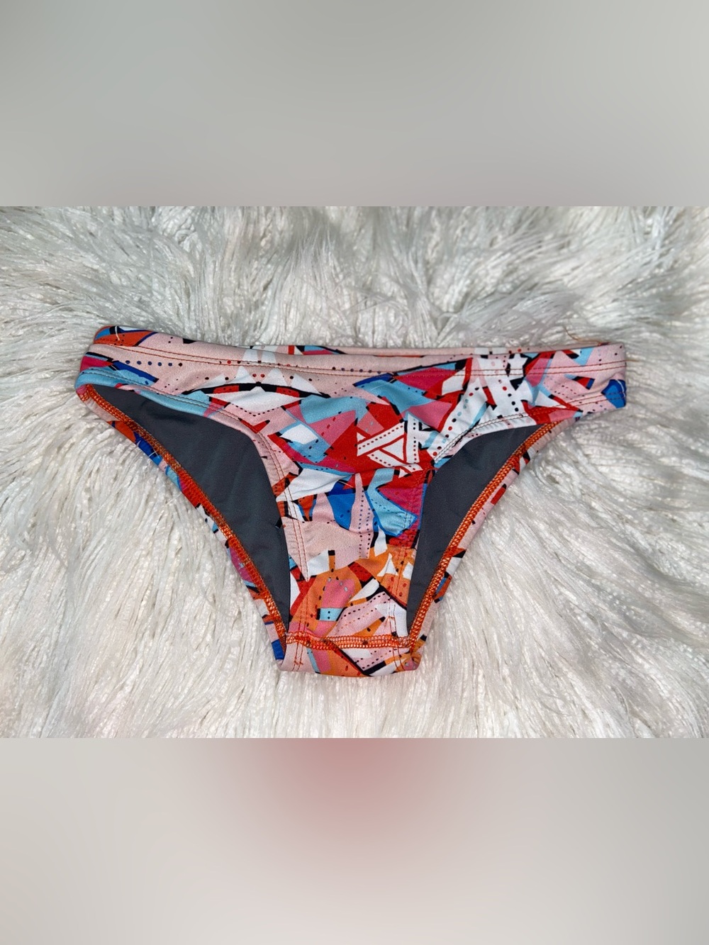 Jolyn Clothing Multicolor Geometric Bikini Bottom in Pink, Red, Blue & Orange